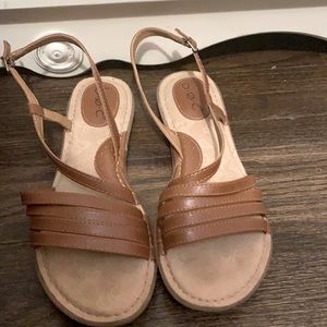 Faux leather brown strappy sandals.